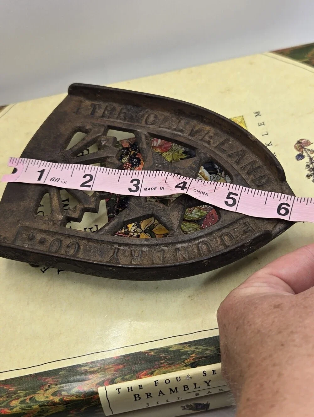 Antique Cast Iron Trivet Manufactured by The Cleveland Foundry Co. in Ohio.